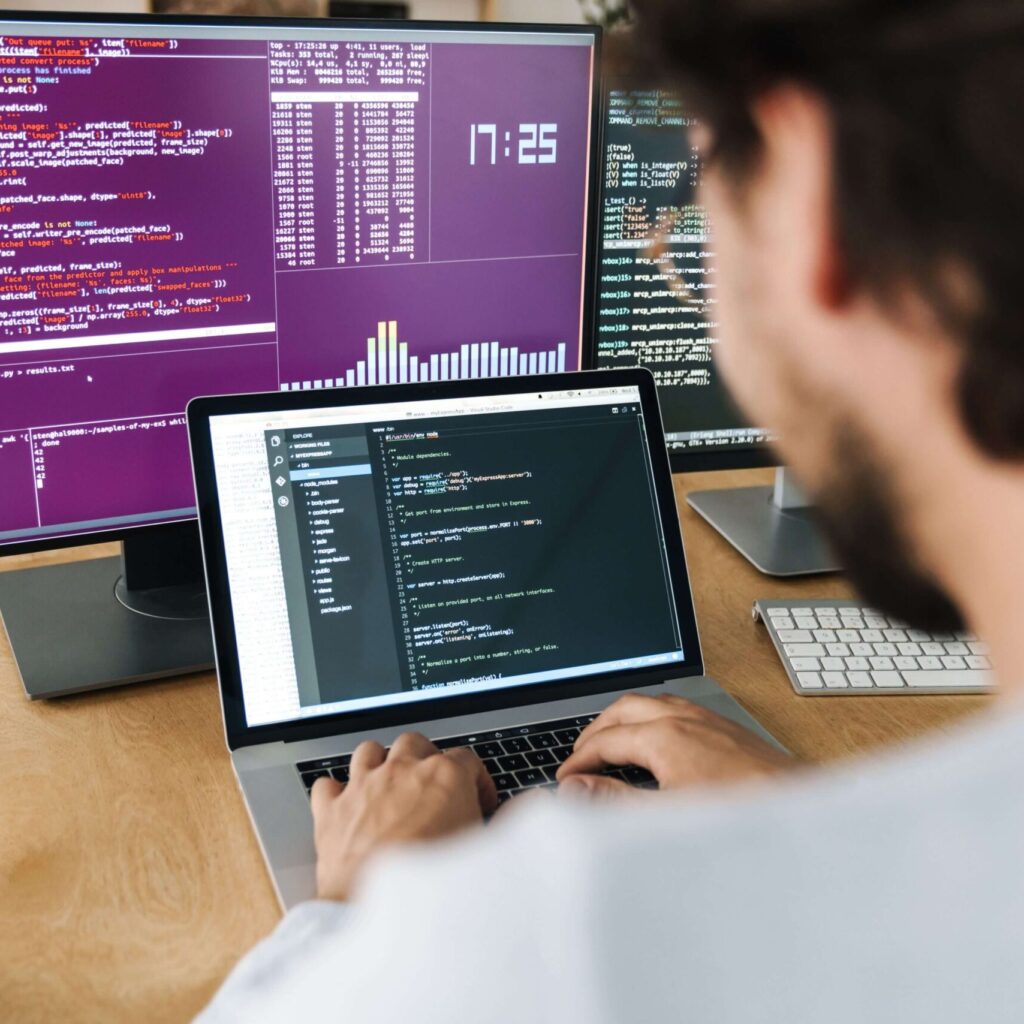 How to Merge Html, Css, and Javascript Into Your Rails App image of focused caucasian programmer man working fq8v7c6